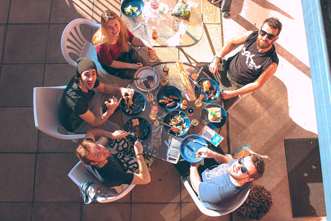 People in a speaking club session at a round table