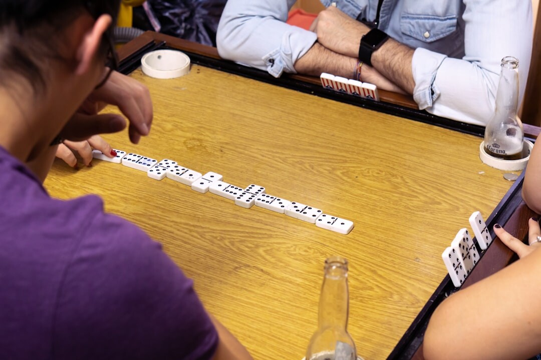 Group of people playing a language learning card game